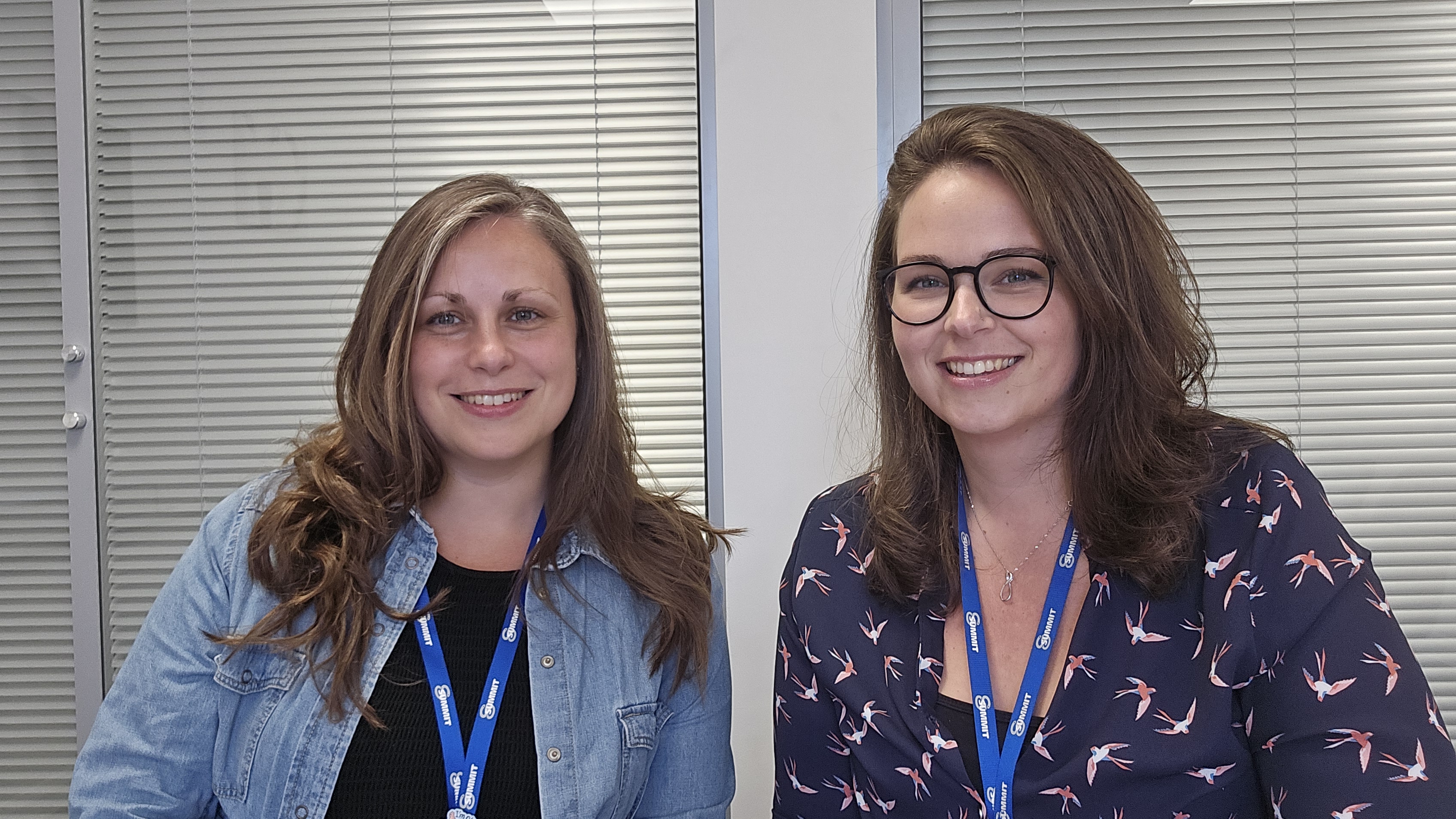 Rachel Bell and Zoe Johnson smiling at the camera