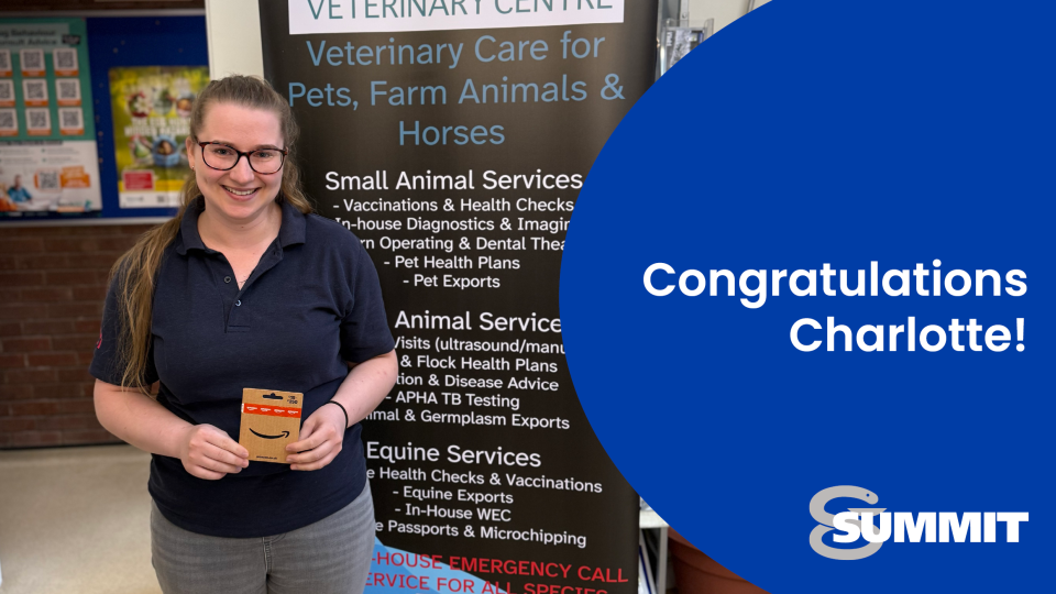 A picture of veterinarian, Charlotte Scott, holding her prize draw gift voucher
